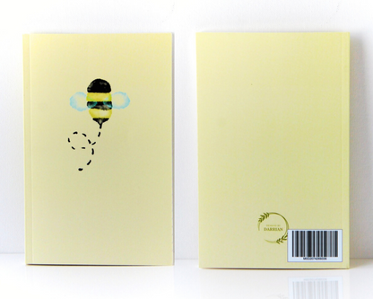 Yellow pastel notebook front and back featuring a watercolour bee on the front